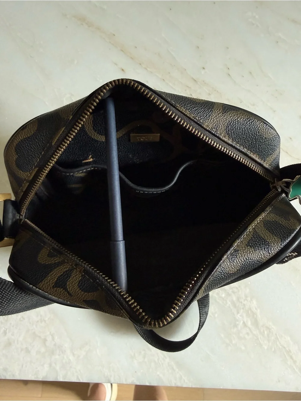 TOUS Chaos Black Crossbody Bag with Brown Pattern and Green Bear Charm